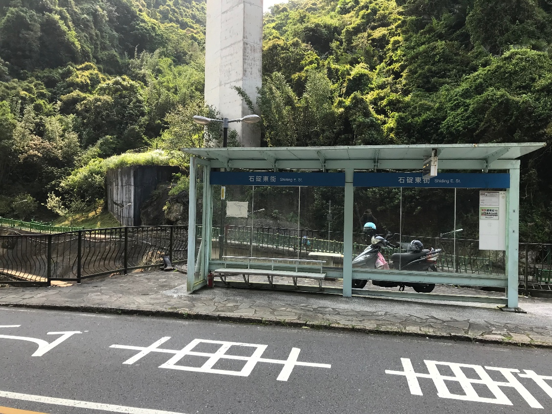 bus stop by the river in taiwan=